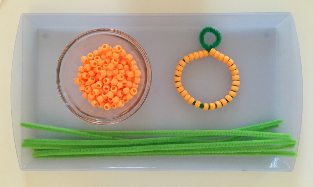 Pumpkin bracelets on the preschool shelf for Halloween 