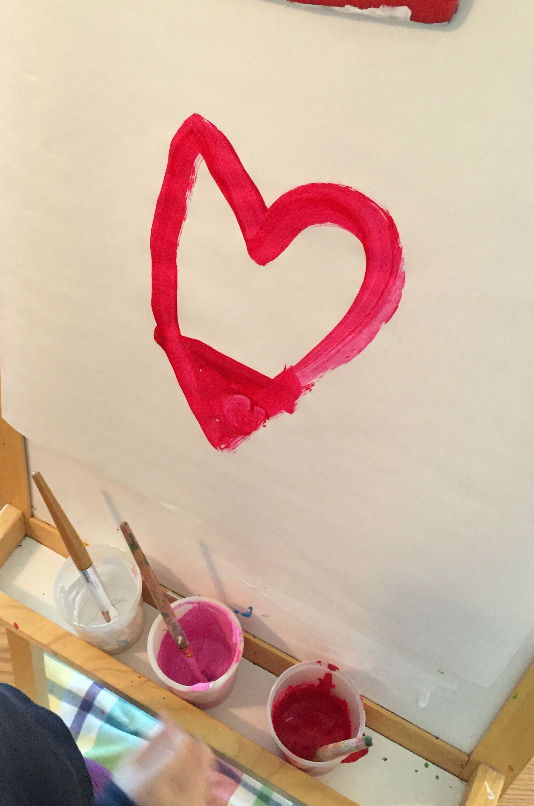 Heart at the easel - Ms. Stephanie's Preschool