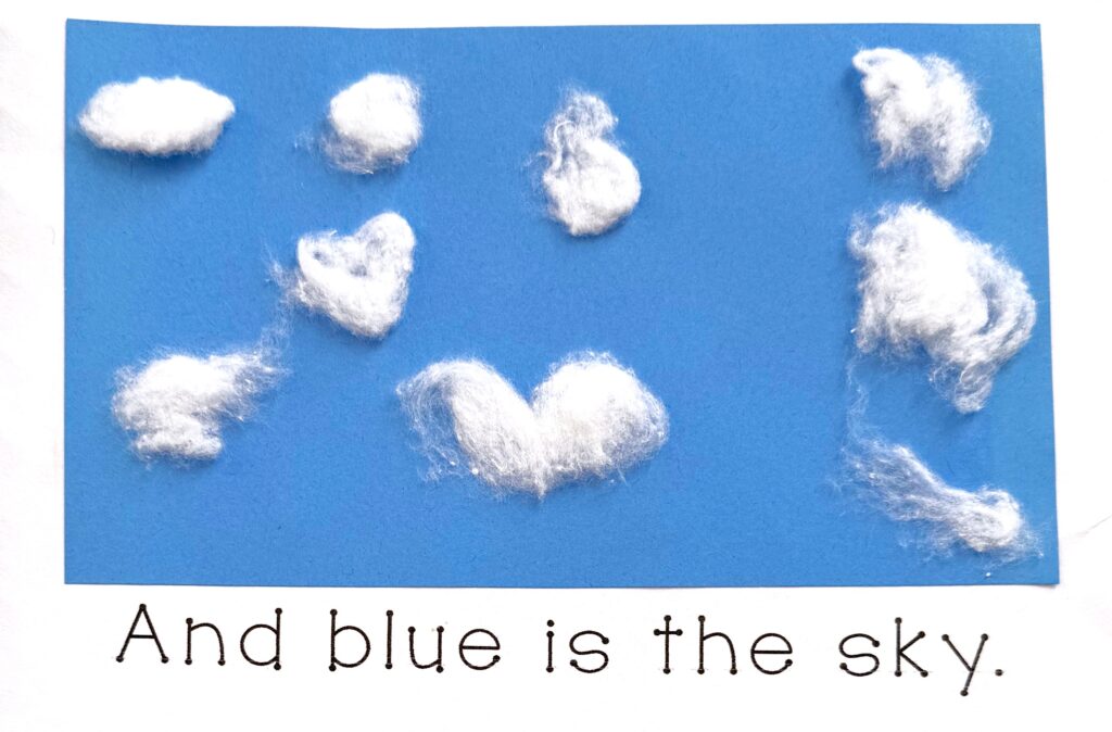 Blue is the sky with cotton ball clouds