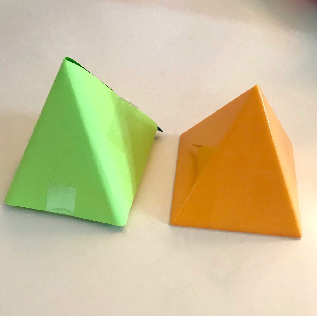Making 3-D Shapes with materials in your classroom like paper.  Paper pyramid 