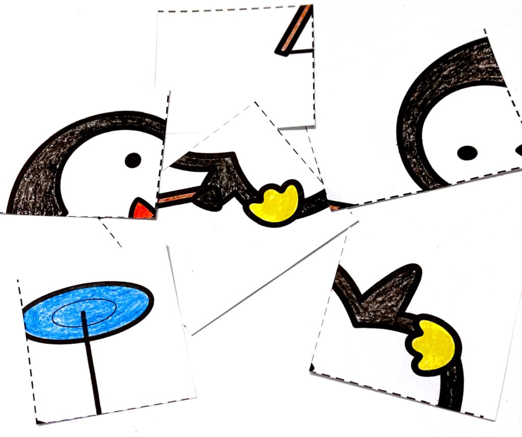 Penguin scissor puzzle colored and cut apart 